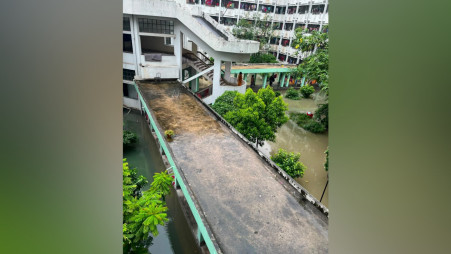 Floodwater inundates Bangamata Sheikh Fazilatunnesa Mujib Hall following heavy rainfall in Dhaka today (12 July). Photo: TBS