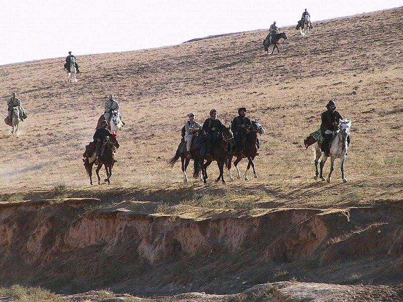US Army Special Forces and US Air Force Combat Controllers with Northern Alliance troops on horseback. Photo: Wikipedia