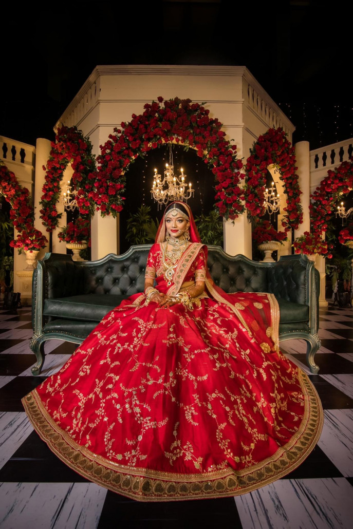 Sayma Islam in her ruby red wedding trousseau by Sabyasachi. Photo: Courtesy 