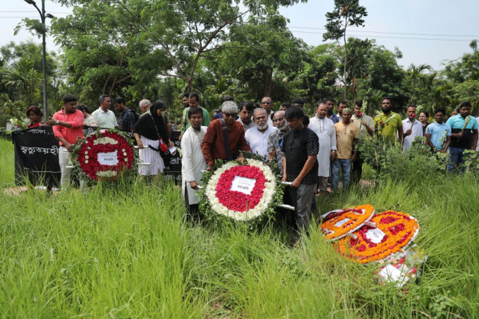 On the occasion of the 11th anniversary of the Rana Plaza collapse, various labour organisations, including garment workers, pay tribute to the victims at Jurain Cemetery in the capital on Wednesday (24 April) and demanded maximum punishment for those responsible for the murder. Photo Mehedi Hasan