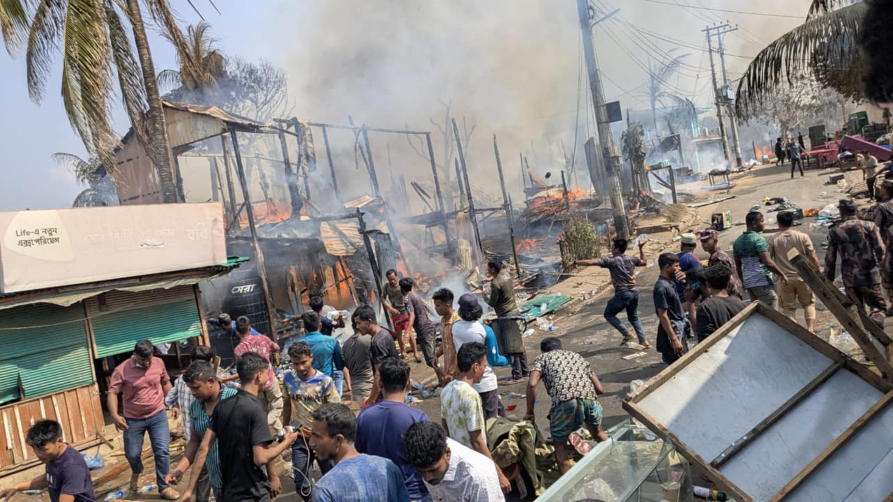 People try to douse a massive fire in Sajek. Photo: Collected