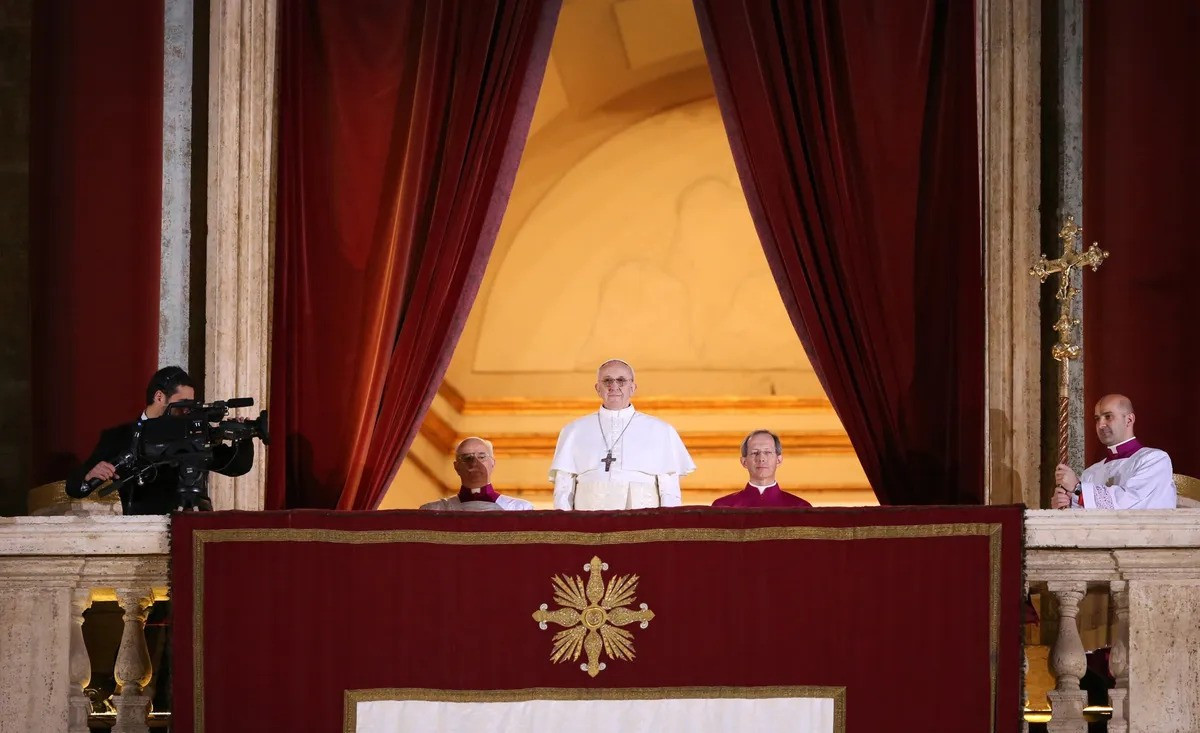 The newly elected pope on the central balcony of St Peter’s Basilica on 13 March 2013. Photo: Bloomberg