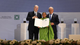 Razia Alam, Chairperson, Maleka Welfare Trust, Bangladesh is presented an Aga Khan Award for Architecture 2019 certificate for the Arcadia Education Project, South Kanarchor, Bangladesh.