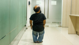 Md Emad Chowdhury is a Dhaka-based journalist living with dwarfism. Photo: Syed Zakir Hossain
