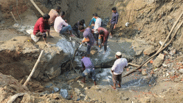 Workers trying a fix holes in the transmission line of CTG Wasa on 19 February 2025. Photo: TBS/File