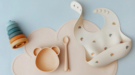 You do not need every gadget at once — start with a good bowl, lovely spoons, and a bib — and add more as your baby grows up. Photo:  Shutterstock