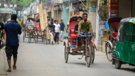 An estimated 1 million battery-powered rickshaws operate in Dhaka. Photo: Saqlain Rizve