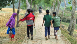Residents of coastal communities have to walk long distances every day just to collect a single pitcher of water. Photos: TBS

