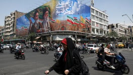 People ride past a billboard depicting the late leader of the Islamic Revolution, Ayatollah Ruhollah Khomeini, and the late Iran's Supreme Leader Ayatollah Ali Khamenei, on a street in Tehran, Iran June 6, 2026. Photo: Reuters