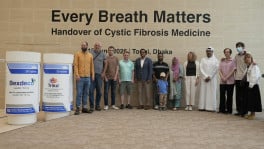 Participants pose for a group photo during Beximco Pharmaceuticals' handover of its generic cystic fibrosis drug, Triko, to patients and representatives from six countries at its manufacturing facility in Tongi on 15 June 2026. Photo: Courtesy