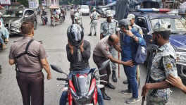 Police conduct security checks at a checkpoint in Dhaka’s Shahbagh area yesterday as authorities tightened security across key points in the capital ahead of the 77th founding anniversary of the banned Awami League. Photo: Rajib Dhar 

